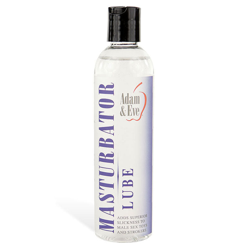 A clear 237 ml plastic bottle with a black cap, labeled MASTURBATOR LUBE in bold purple letters, is from Adam & Eve. Featuring a red apple logo, its a water-based lubricant that enhances slickness for male sex toys and strokers and is condom-compatible.