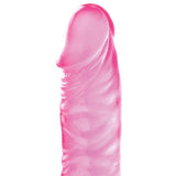 The Adam & Eve Jelly Slim Dildo is a pink, translucent silicone toy shaped like a fingertip. It features smooth curves with subtle ridges and a rounded, flattened tip. The glossy texture beautifully reflects light, resembling the top portion of a finger or similar object.