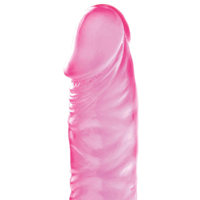 The Adam & Eve Pink Jelly Slim Dildo is a pink, translucent silicone object resembling a finger with a rounded tip and textured ridges. Its smooth, shiny surface reflects light as it sits centered against a plain white background.