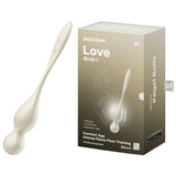 The image features a white vibrating Kegel ball device, the Satisfyer Love Birds 1, alongside its packaging. The box highlights Vibration and Full Silicone, and the device offers advanced pelvic floor training via Bluetooth with the Satisfyer Connect App.