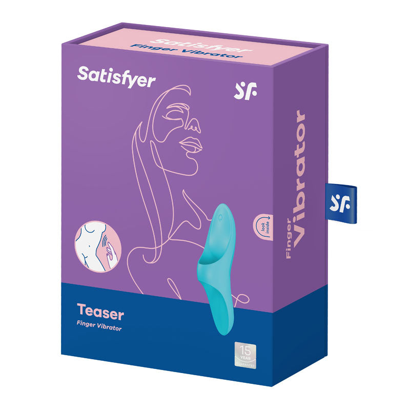 The image shows a purple box for the Satisfyer Teaser - Light Blue USB Rechargeable Finger Stimulator made of body-friendly silicone. It highlights the teal devices vibrating features and a 15-year warranty, with a womans face outline on it and a small blue tab with the logo on the side.