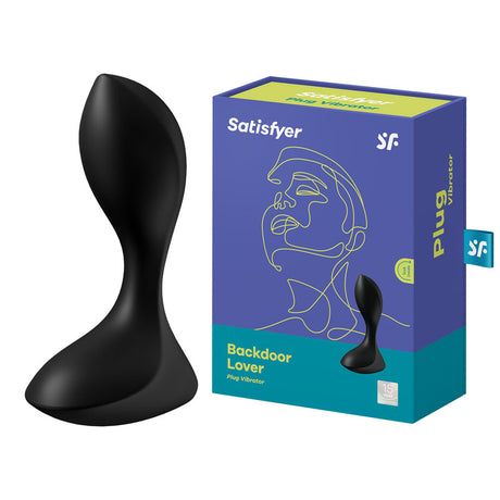 The image showcases a sleek black Satisfyer Backdoor Lover USB rechargeable vibrating butt plug made from body-friendly silicone. Its positioned next to a vibrant blue and green box featuring a stylized face drawing, with the brand Satisfyer prominently displayed.