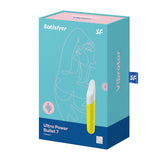 The image features the Satisfyer Ultra Power Bullet 7 in a blue and teal box, including a minimalist face drawing. Vibrator and sound wave icons are prominent. Made from body-friendly silicone, the product itself is vibrantly yellow and white.