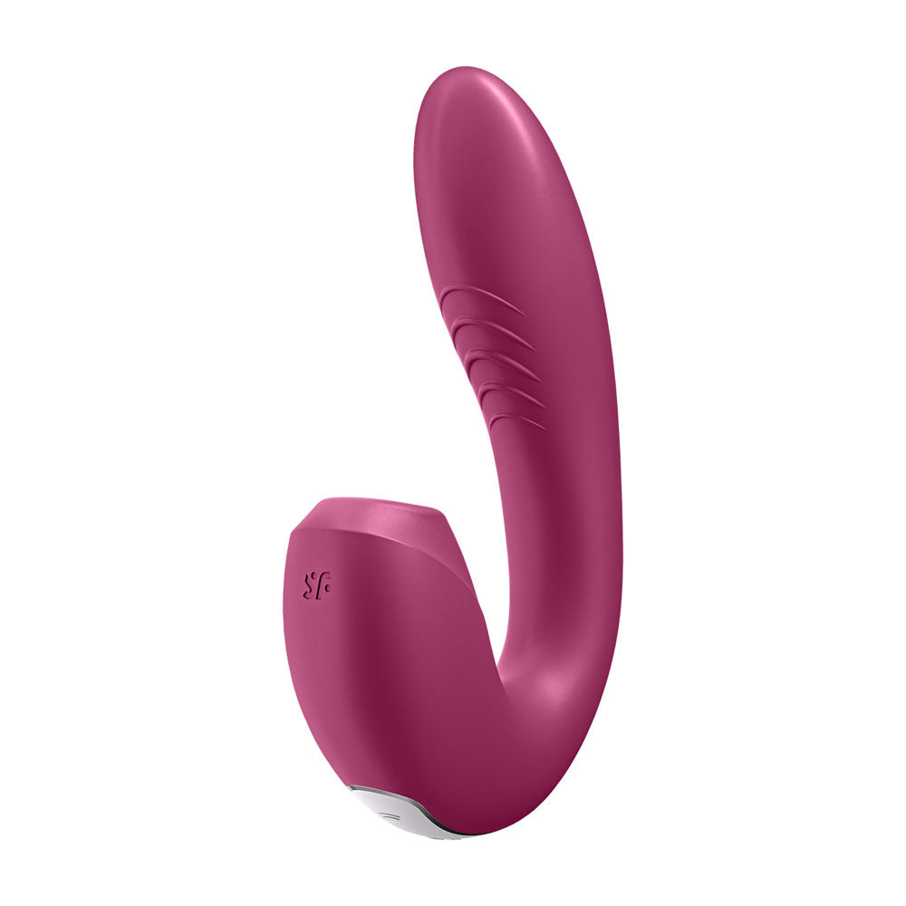 The Satisfyer Sunray in berry is a Bluetooth-enabled ergonomic massager, seamlessly connecting to the Satisfyer Connect app. It features a smooth, elongated shaft with subtle ridges and an intuitive control interface on its flat-angled base for comfort and functionality.