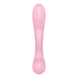 A sleek, modern Satisfyer Triple Oh - Pink USB Rechargeable Rabbit Vibrator in light pink features a double-ended, body-safe silicone design with rounded ends and a tapered middle. The smooth, symmetrical appearance includes a subtle Triple Oh logo at the center against a plain white background.