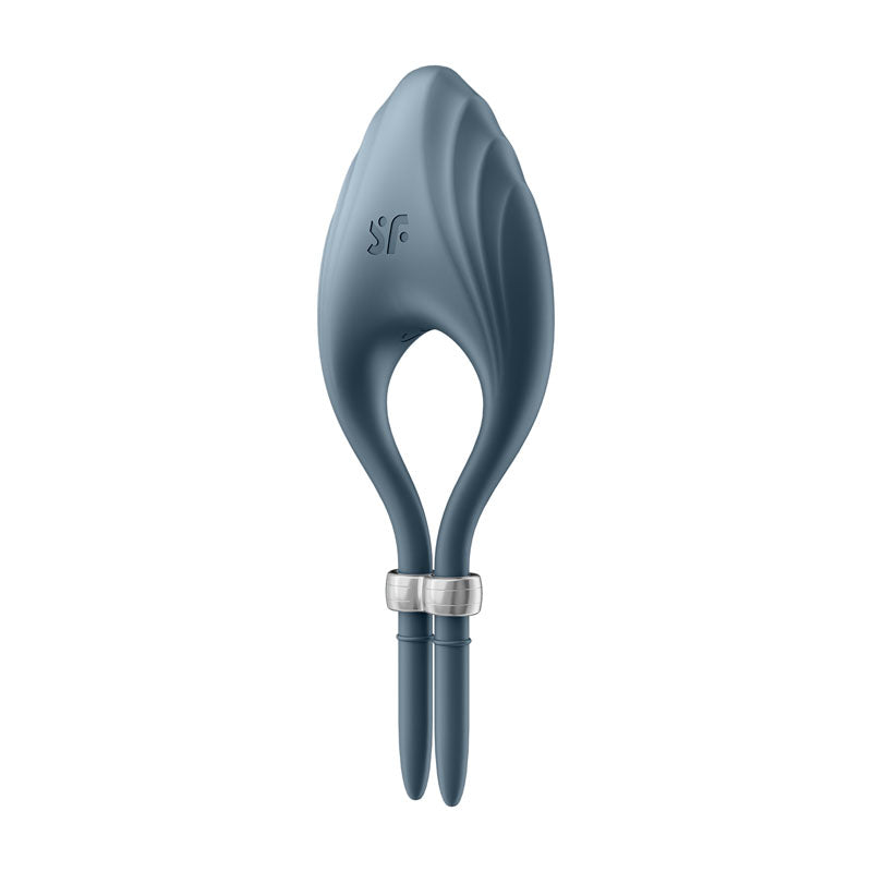 The Satisfyer Duelist in dark blue features a leaf-like abstract sculpture design with a looped handle, similar to an adjustable penis ring. Its dual elongated parts and metallic band provide a smooth, matte finish.