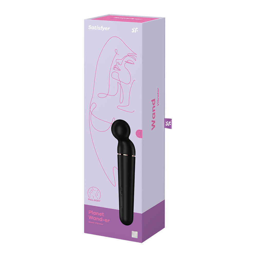 The image displays a black Satisfyer Planet Wand-er massager next to its mostly white packaging with purple accents. The box features the brand name, an abstract pink line drawing, and a purple band indicating the product is waterproof.