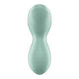 The Satisfyer Exciterrr - Mint USB Rechargeable Stimulator is a mint green, ergonomic lay-on vibrator with a wavy hourglass shape, two small holes for charging or connecting, and a sleek, modern design featuring smooth curves. It offers a minimalist aesthetic thats waterproof and discreet.