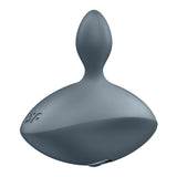 The Satisfyer Booty Absolute Beginners 4 is a grey, USB-rechargeable silicone plug with a slender, tapered tip that widens to a broad, curved base for ergonomic comfort. Its smooth surface includes a small logo near the base.