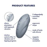 The image showcases the Satisfyer Tap & Climax 1, a bluegrey USB rechargeable pulsing stimulator with an ergonomic, body-safe silicone design. It features two independently controlled motors, intuitive controls for 11 programs, magnetic charging, clitoris stimulation with tapping and vibrations—all waterproof.