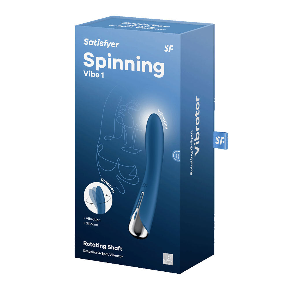 The Satisfyer Spinning Vibe 1s blue box showcases an illustration emphasizing features like Vibrating Shaft, Rotation, Silicone, and its waterproof design. The packaging highlights its branding, USB rechargeable capability, and multiple vibration modes.