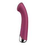 The Satisfyer Spinning G-Spot 1 in red is a 16.5 cm USB rechargeable rotating vibrator with a sleek design, ergonomic shape, and metallic silver base for elegance. Its discreet modern look includes waterproof features for versatile enjoyment.