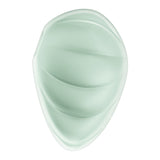 The Satisfyer Cloud Dancer in mint features an oval shape with ridged, wave-like contours. Its smooth texture and glossy finish create gentle curves and subtle shadows, resembling a pressure wave vibrator.