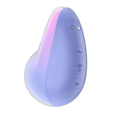 The Satisfyer Pixie Dust is a teardrop-shaped device in violet and pink, offering pressure wave programs for clitoral stimulation. It features three buttons with wave, sound, and power symbols, plus a gradient pink accent on the edge and two indicator lights on top.