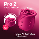 The Satisfyer Pro 2 Classic Blossom - Red, a USB rechargeable air pulse rose stimulator, features an elegant silicone design with Air Pulse and Liquid Air technologies, a New Cap, and is entirely crafted from full silicone against a gradient background.