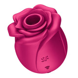 The Satisfyer Pro 2 Classic Blossom is a red, silicone rose-shaped device with layered petals and a central opening. It features a base embossed with the SF logo and Wi-Fi symbol, displaying Liquid Air Technology that merges natural forms with modern elements.