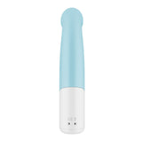 The image shows a blue, cylindrical device similar to the Satisfyer Playful Four, featuring a rounded top and white base with a CE marking and charging holes. Its smooth design and two-tone color scheme suggest it could be part of an elegant USB rechargeable vibrator set with 4 interchangeable functions.