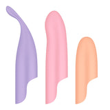 Three abstract, curved brushstroke shapes in pastel colors—purple on the left, pink in the middle, orange on the right—emulate the sleek design of a Satisfyer Playful Four USB rechargeable vibrator with 4 interchangeable heads, set against a plain white background.