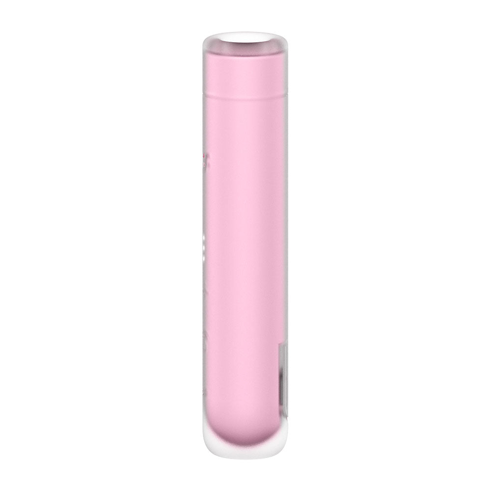 The Satisfyer First Kiss, a cylindrical pink USB rechargeable air pulse stimulator, features a glossy finish with a removable transparent cap. Beneath its subtle silicone layer is a small rectangular LED indicator. It stands vertically, cap side up, against a plain white background.