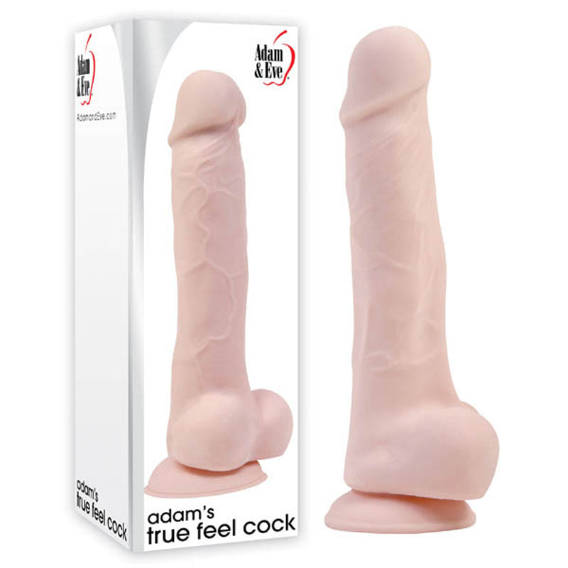 A realistic flesh-toned dildo made from True Feel TPE stands next to its box, showcasing the lifelike design and texture. The packaging highlights the Adam & Eve brand and product name Adams True Feel Cock, underscoring its quality craftsmanship and suction cup base.