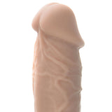 The Adam & Eve Adams True Feel Cock XL - Flesh 26.7 cm (10.5) Dong is a realistic silicone anatomical model mimicking natural skin with detailed textures and folds, featuring a suction cup base for stability against a plain white background, enhancing its authentic appearance.