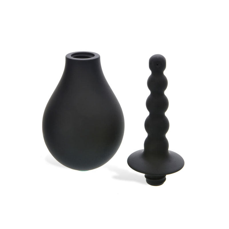 The Adam & Eve Smooth & Easy Silicone Douche features a black, matte-finished silicone enema bulb with a wide opening for easy cleaning and a detachable beaded tip for comfortable anal douching, complete with a flared base for safety and easy handling.