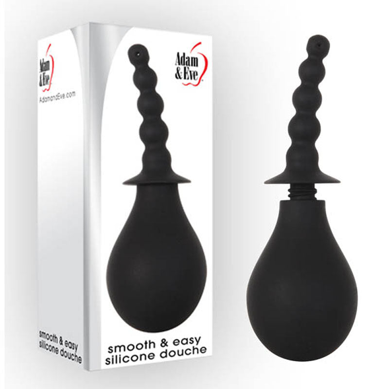 The Adam & Eve Smooth & Easy Silicone Douche, available boxed or unboxed, features a black silicone design with a smooth ribbed applicator and bulbous handle. Ideal for anal douching, it ensures easy cleaning. The packaging includes a convenient website link.