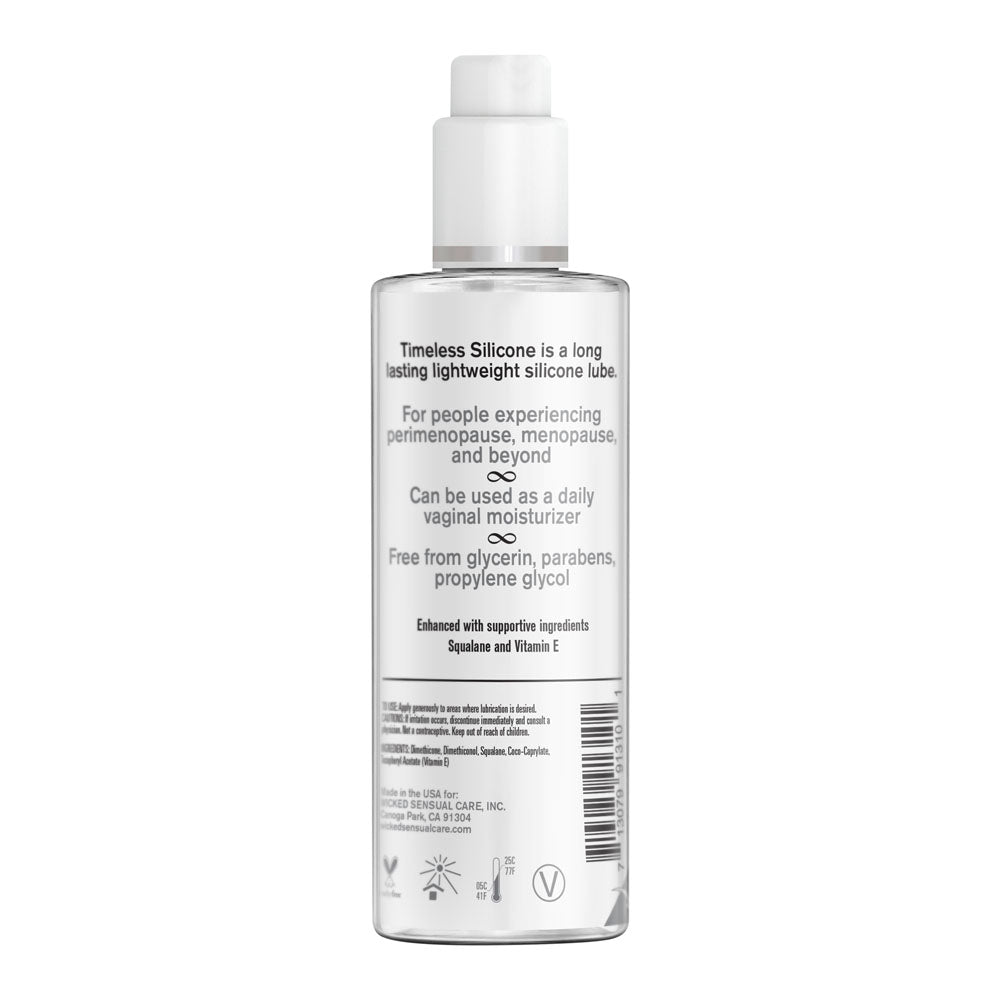 A 120 ml clear bottle of Wicked Simply Timeless Silicone intimate lubricant featuring a white pump. Described as long-lasting and lightweight, its ideal for menopausal support, also serving as a daily moisturizer. Free from glycerin, parabens, and propylene glycol.