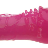 Close-up of Adam & Eves Slim Pink Pleaser, an 8-inch bright pink vibrator with a glossy, flexible rubber-like surface featuring irregular raised ridges and spikes, resembling abstract textures. Its waterproof for versatile use.