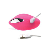 The product is a sleek, compact Adam & Eve Eves Rechargeable Vibrating Panty With Remote in pink, featuring an elegant oval design with metallic accents and a white detachable USB cable, resembling a sophisticated vibrator against a plain white background.