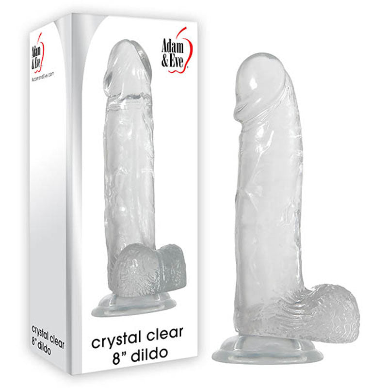 A clear, large dildo offers a realistic feel, detailed textures, and a stable suction cup base. Displayed with packaging featuring an image and the text: Adam & Eve Crystal Clear 8” Dildo - Clear 20.3 cm (8) Dong.