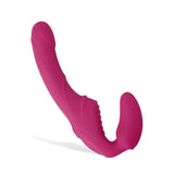 The Adam & Eve Eves Vibrating Strapless Strap-On in magenta, 22 cm long, features a dual-ended ergonomic design. One end is elongated and smooth; the other is bulbous. A central power button enables customizable settings for vibrating G-spot pleasure. Its USB rechargeable for convenience.