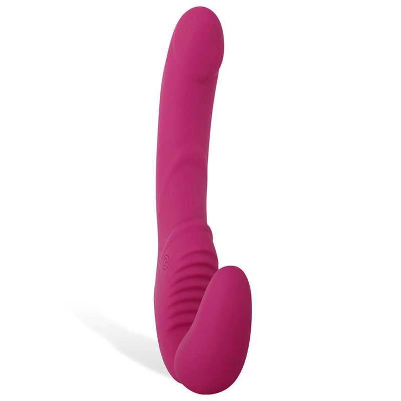 The Adam & Eve Eves Vibrating Strapless Strap-On in pink features a curved 22 cm silicone shaft with subtle ridges for targeted G-spot pleasure and a bulbous base for external stimulation. Its ergonomic shape allows for dual stimulation and stands upright, USB rechargeable.