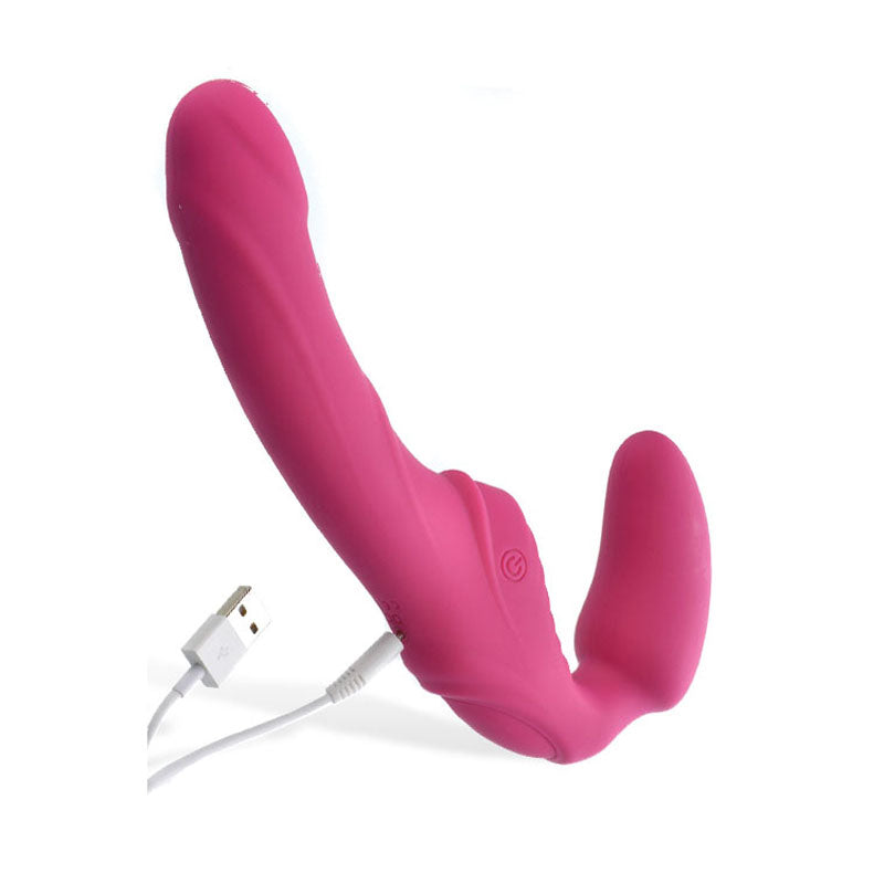 The Adam & Eve Eves Vibrating Strapless Strap-On in pink is an ergonomically designed, 22 cm dual-ended silicone toy with a sleek surface, curved shape, textured lines for grip, USB rechargeable feature, and vibrant G-spot stimulation.