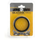 The Boneyard Silicone Ring, also known as the 50mm Black Cock Ring, is a man toy with 3x-stretch. Its packaging displays a black ring in a transparent section, highlighted by Bone Yard on a yellow skull-patterned backdrop and features a Bone for Life winged banner.