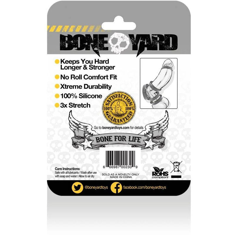 The image displays Boneyard Silicone Ring 50mm packaging with benefits like Keeps You Hard Longer & Stronger, No Roll Comfort Fit, Xtreme Durability, and “3x Stretch.” The design features skull graphics and a “Satisfaction Guaranteed” seal, ideal for man toys.