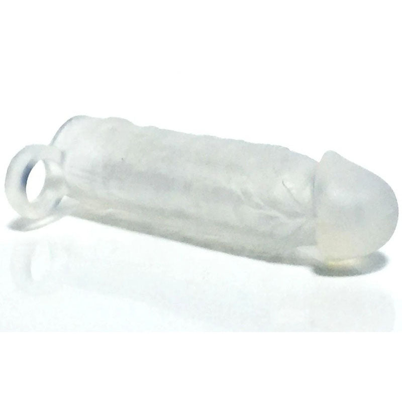 The Boneyard Meaty Cock Extender - Clear is a translucent silicone sleeve with a phallic shape that serves as a penis extender. It features textured ribbing along the shaft for enhanced sensation, has a rounded tip, and includes a loop at the end, lying on a plain white surface.