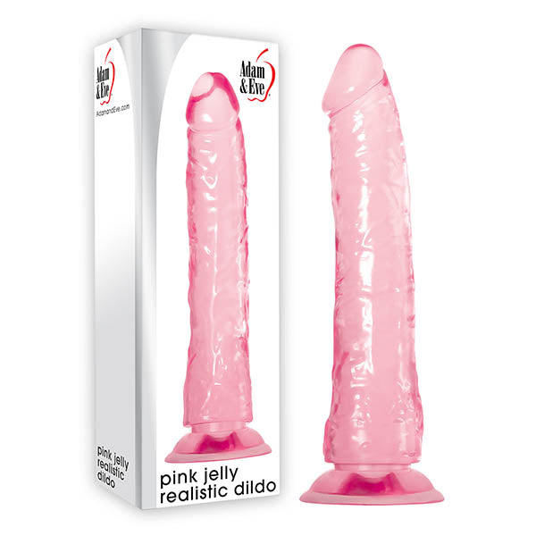 The Adam & Eve Pink Jelly Realistic Dildo features a lifelike, curved design with a flexible shaft and veined texture. Standing beside its packaging, the dildo includes a sturdy suction cup base. The box reads Pink Jelly Realistic Dildo - Pink 21 cm (8) Dong, complementing the toy’s realistic appearance.