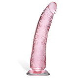 The Adam & Eve Pink Jelly Realistic Dildo showcases a subtly curved, cylindrical shape with a textured surface. Its rounded tip and flat, suction cup base add to its artisanal design, while the lighting enhances its glossy finish for a sophisticated glasswork effect.