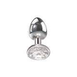 The Adam & Eve Clear Gem Anal Plug - Small features a sleek, chrome-finished, egg-shaped design crafted from body-safe polished aluminum. Its handle tapers to a circular base adorned with textured clear facets, perfect for temperature play against a plain white background.