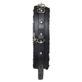 Discover the Adam & Eve Hog Tie for the ultimate BDSM experience. This black leather restraint features a buckle fastening, luxurious fur-lined interior, metal rivets, a central D-ring with an attached clip, and an adjustable strap for a perfect fit in all bondage play scenarios.