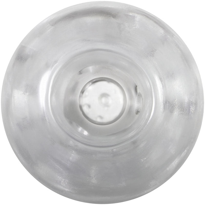 A top-down view of the Adam & Eve Triple Chamber Ball Drainer - Clear Masturbator Sleeve reveals a transparent, thick-base design. Light reflections create circular patterns, reminiscent of pleasure nubs. The plain white background enhances its smooth and clear allure.