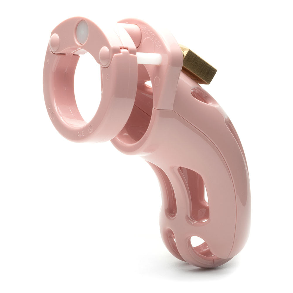 The Curve Chastity Cock Cage Kit offers a pink 3.75-inch ergonomic plastic design with a curved sheath and circular locking ring for custom fit. It includes ventilation slits, a brass padlock for added security, and is set against a plain white background.