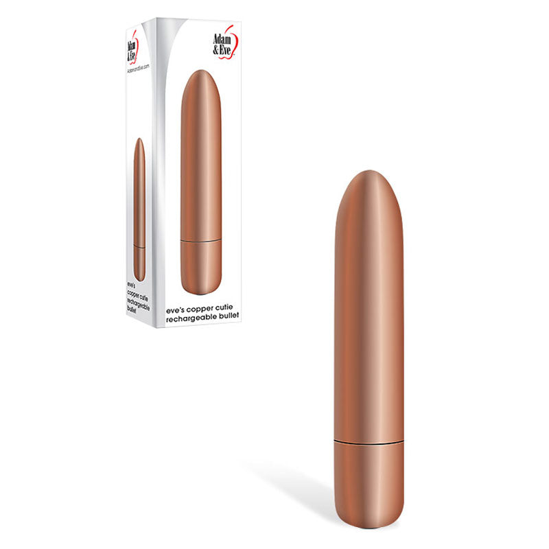 A bronze-colored, cylindrical rechargeable massager stands upright beside packaging echoing its design. Featuring Adam & Eve and Eves Copper Cutie, its a 10-function vibrating motor with a sleek, waterproof design for versatile pleasures.