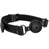 The Adam & Eve Eves Fetish Dreams Ball Gag features a black vegan leather strap with quilted stitching, metal rivets, and adjustable buckles. It includes a breathable black silicone ball gag and metal rings for a secure fit.