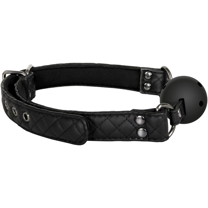 The Adam & Eve Eves Fetish Dreams Ball Gag features a black quilted, breathable ball with adjustable vegan leather straps and a metal buckle. Its padded interior ensures comfort, while metal rings on each side allow for easy attachment or adjustment.