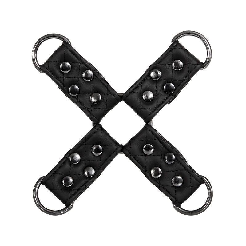 Part of the Adam & Eve Fetish Dreams Advanced Bondage Set, this black cross restraint is made from vegan leather with a quilted texture, metal studs, sturdy edge stitching, and four D-rings, making it sleek and functional for any bondage set.