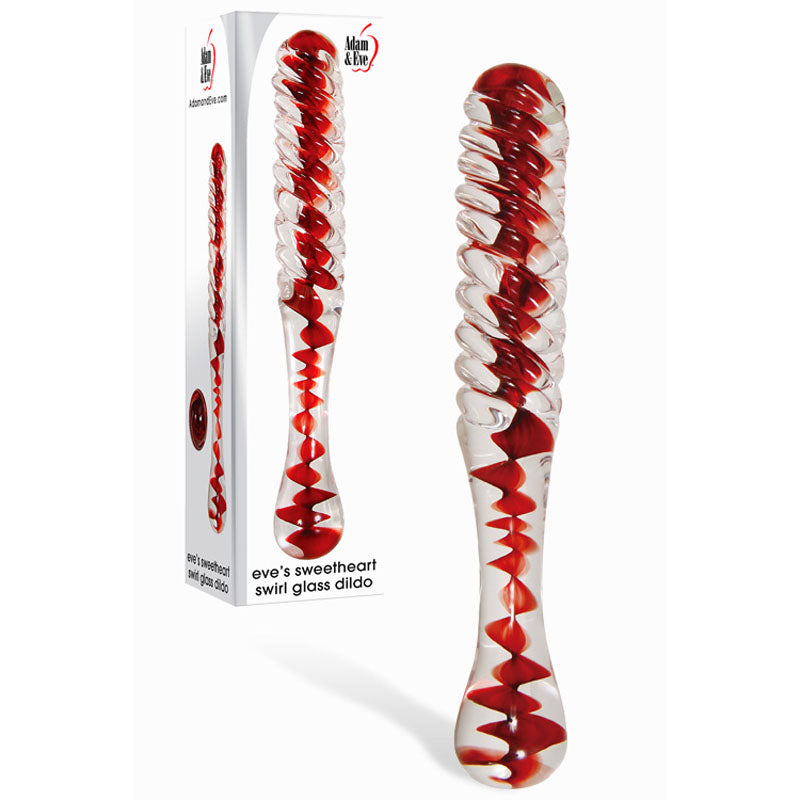 A clear, handcrafted glass dildo with red swirls spiraling its length. Made from durable borosilicate glass with a smooth texture and rounded ends, the Adam & Eve Sweetheart Swirl Glass Dildo is presented in elegant white packaging accented in red.