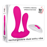 The image displays packaging for the Adam & Eve Rechargeable Dual Entry Vibe, featuring a pink dual-pronged silicone vibrator and a white remote with pink buttons. The text highlights 9 powerful vibrating speeds & functions.