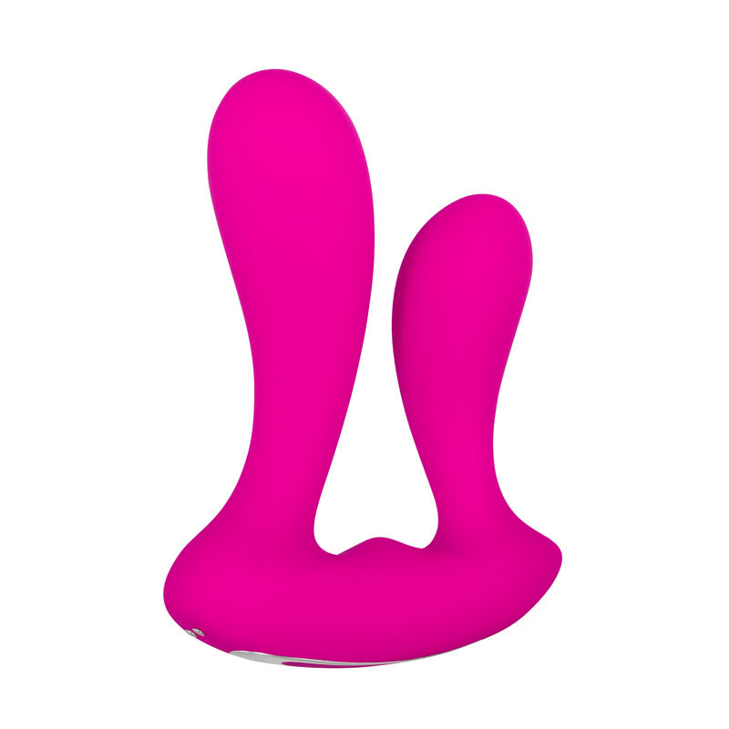 The Adam & Eve Rechargeable Dual Entry Vibe is a bright pink U-shaped silicone device featuring two asymmetrical rounded shafts. With a wider base accented by metallic details, this smooth and modern dual-ended massager enhances personal wellness and relaxation. USB rechargeable with remote control.